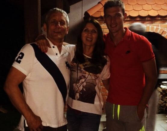 Borna Barisic with his parents.